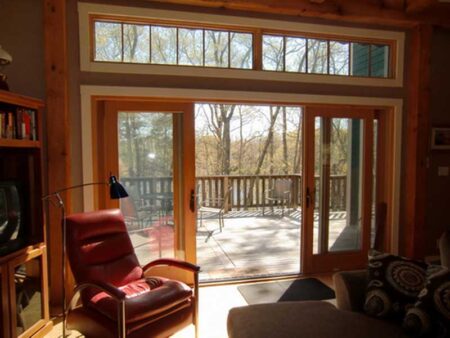 Vacation Rental Property - Bungalow - Orleans Mass., 9 Pond Road - Lake House Great Room Open Doors to Deck and sectional