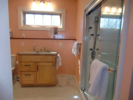 Vacation Rental Property - Bungalow - Orleans Mass., 9 Pond Road - Lake House Upper Level Bath Peach with Cabinet and Shower